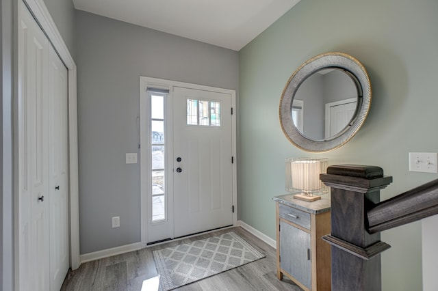 entryway with light hardwood / wood-style floors