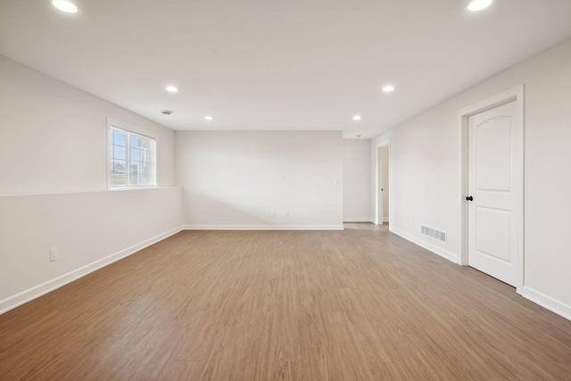 empty room featuring hardwood / wood-style floors