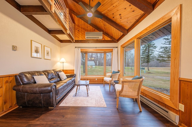 living room with wood walls, lofted ceiling with beams, dark hardwood / wood-style flooring, baseboard heating, and a wall unit AC