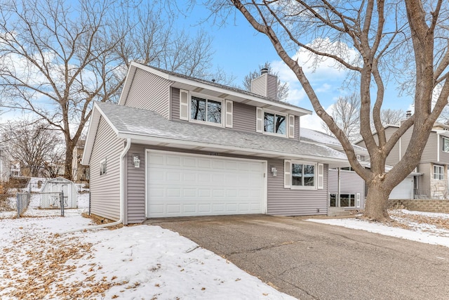 front of property featuring a garage