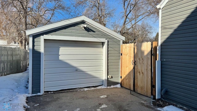 view of snow covered garage