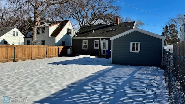 view of snow covered property