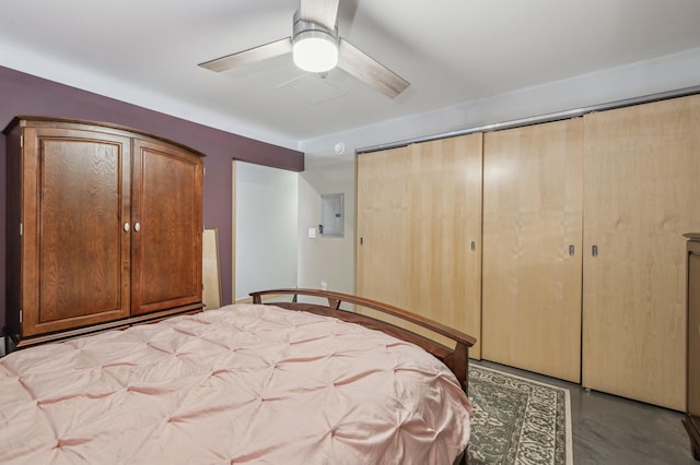 unfurnished bedroom with electric panel, a closet, and ceiling fan