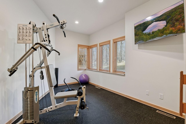 exercise room featuring recessed lighting, visible vents, and baseboards