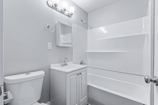 full bathroom with vanity, a textured ceiling, toilet, and shower / bath combination