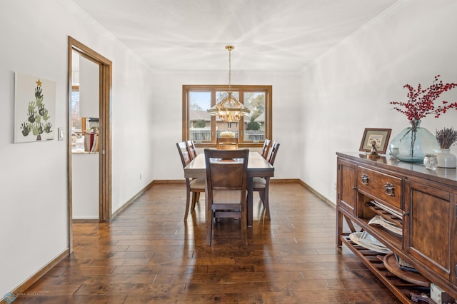 dining space featuring an inviting chandelier, crown molding, and dark wood-type flooring