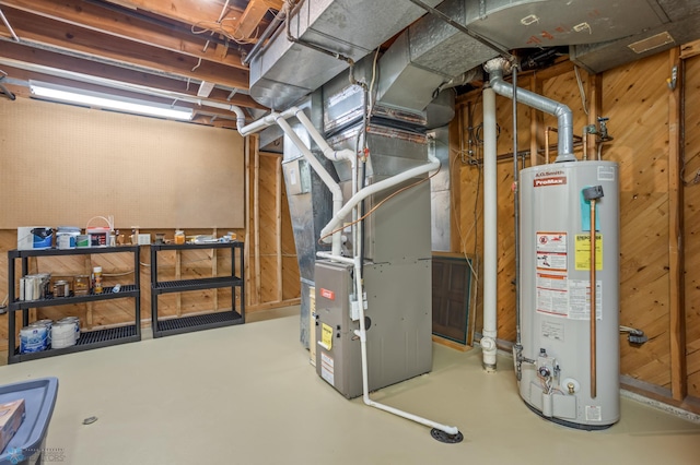 utility room featuring heating unit and gas water heater