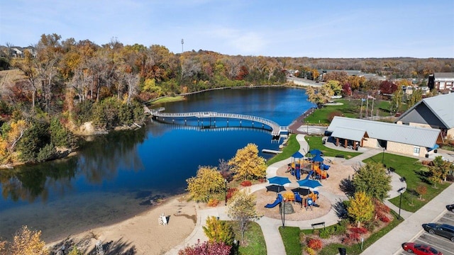 birds eye view of property with a water view