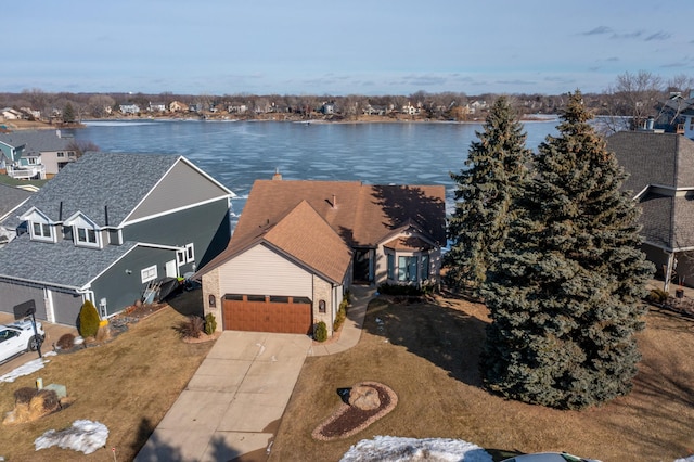 bird's eye view with a water view