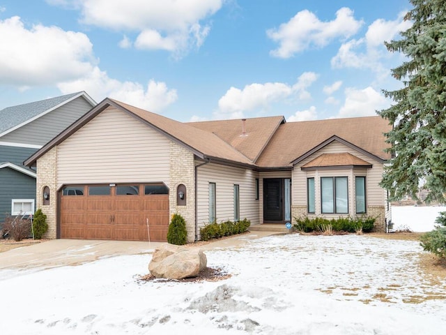 single story home featuring a garage