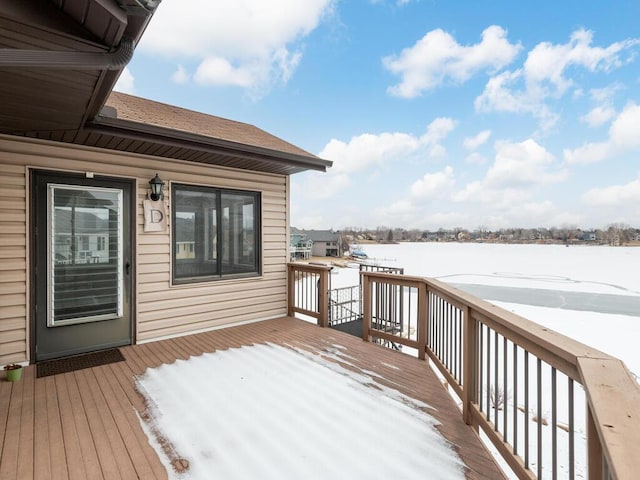 view of snow covered deck