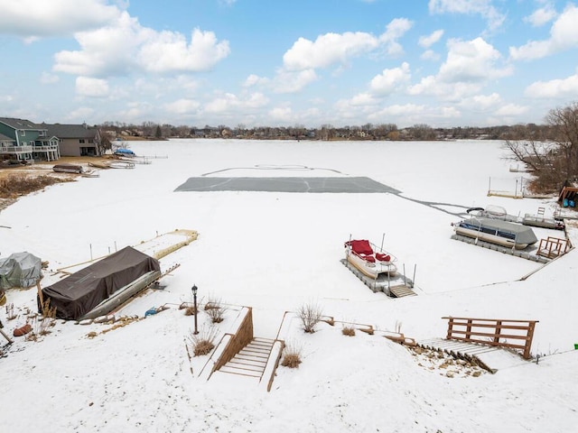 view of yard layered in snow