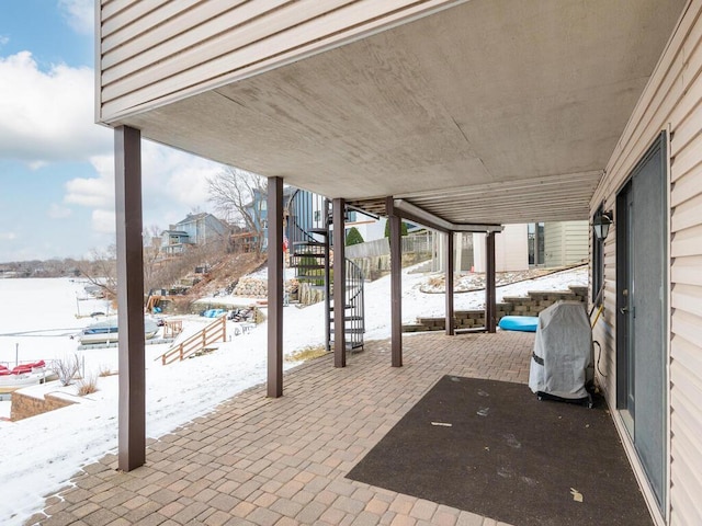 view of snow covered patio