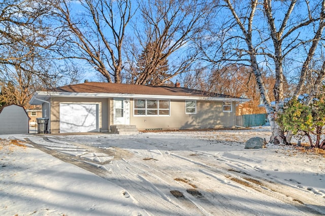 ranch-style home with a garage