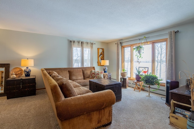 living room with light carpet, a textured ceiling, and baseboard heating