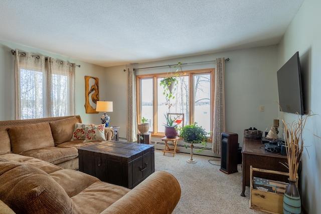 living area with a textured ceiling, a baseboard radiator, and light colored carpet