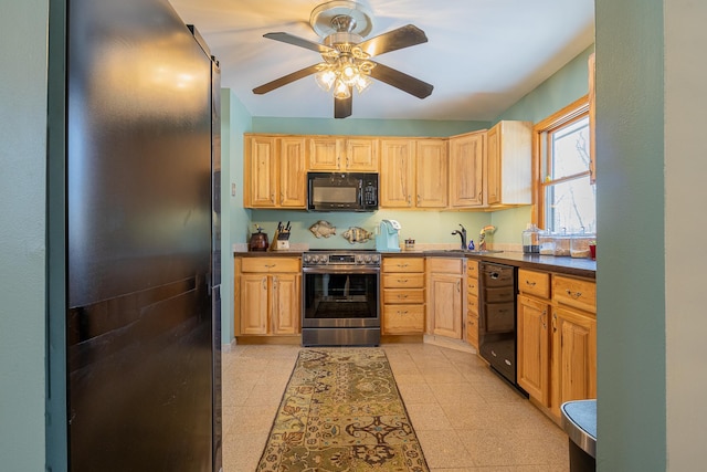 kitchen with dark countertops, ceiling fan, black appliances, light brown cabinets, and a sink