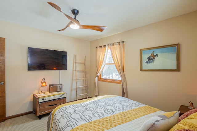 bedroom featuring light colored carpet, ceiling fan, and baseboards