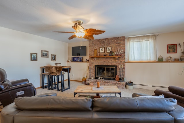 living room with a fireplace, light colored carpet, baseboard heating, ceiling fan, and baseboards