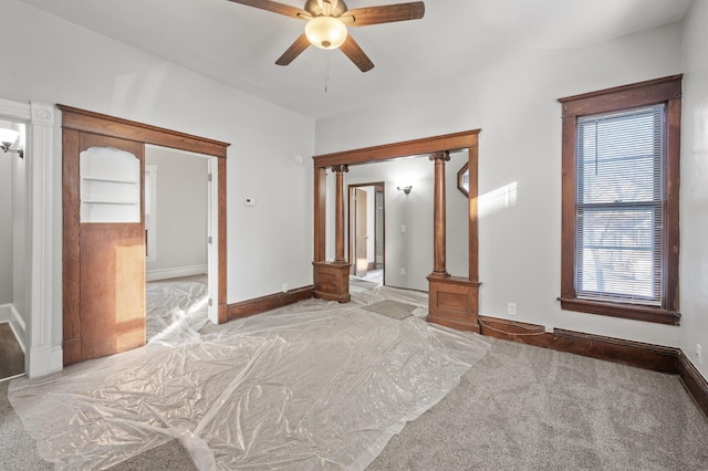 unfurnished bedroom featuring light carpet and ceiling fan