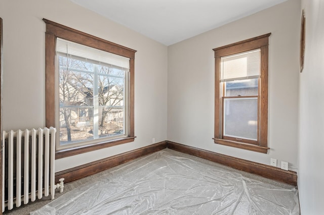 unfurnished room with radiator