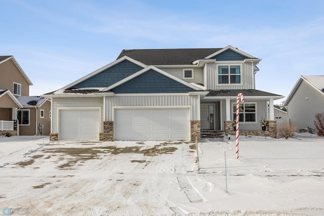 craftsman house with a garage