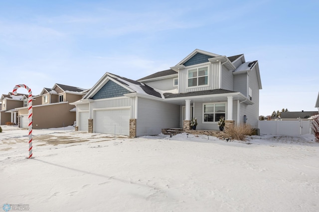 craftsman-style home with a garage