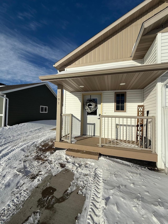 view of snow covered deck