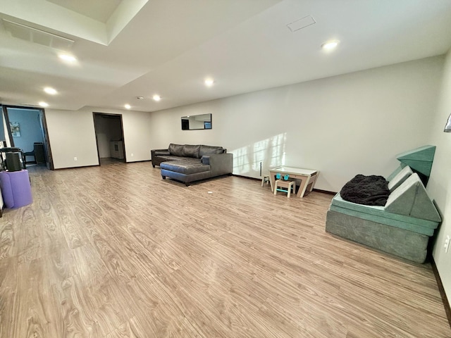 living room with light hardwood / wood-style floors