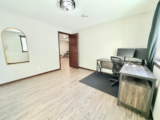 office space featuring light hardwood / wood-style floors