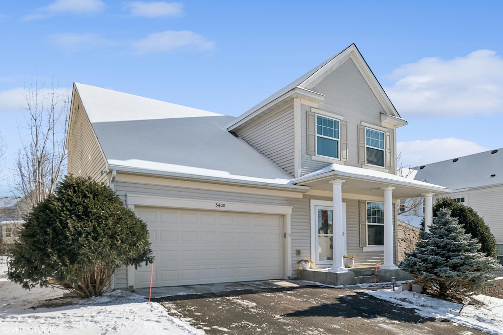 view of front of home with a garage