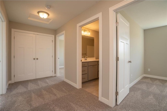 hallway with light carpet