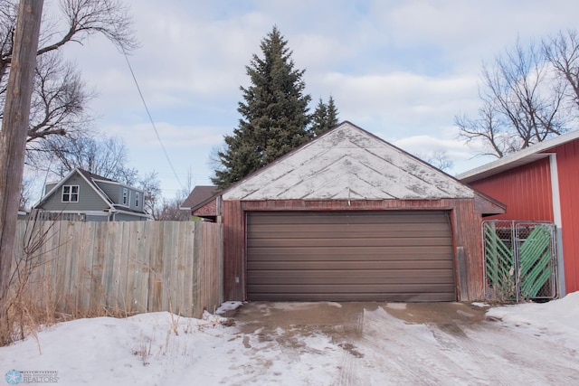 view of snow covered garage