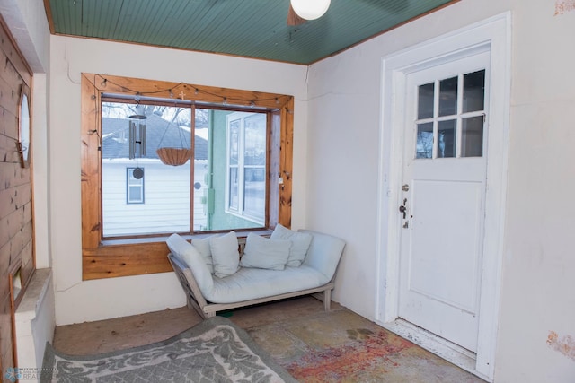 living area featuring concrete floors