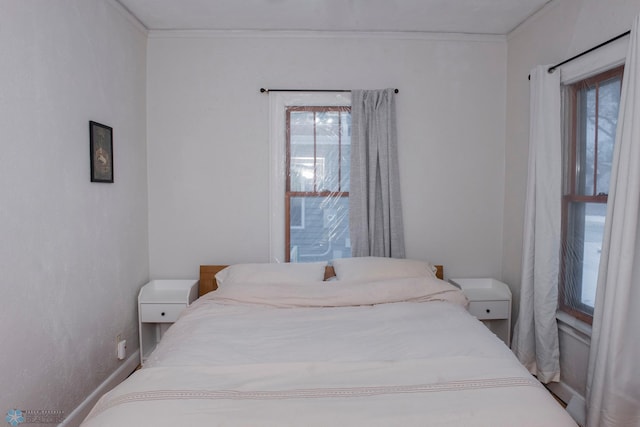 bedroom featuring ornamental molding