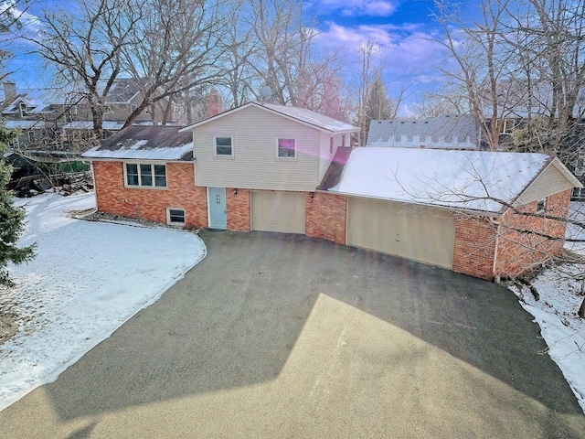 split level home with a garage