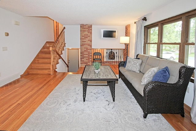 living room with light hardwood / wood-style floors