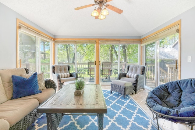 sunroom / solarium with vaulted ceiling and ceiling fan