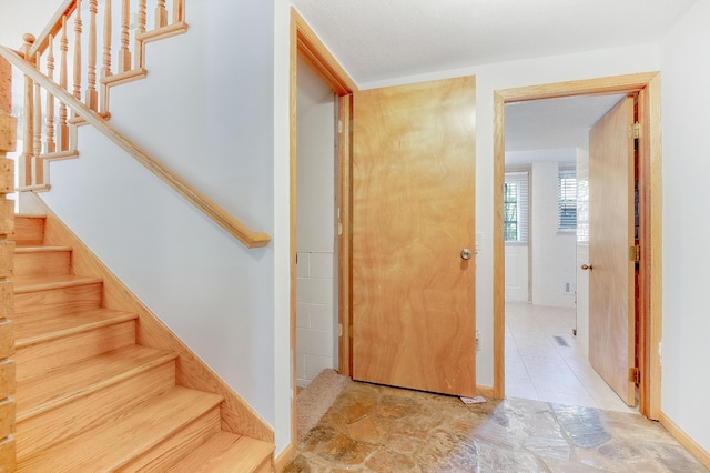 interior space with light tile patterned floors