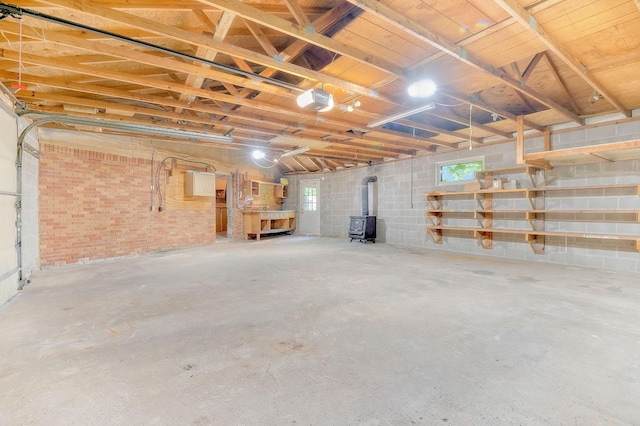 basement featuring a wood stove