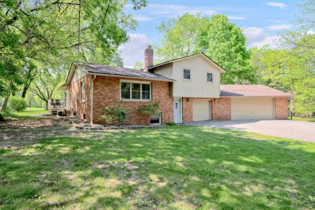 tri-level home featuring a front yard and a deck