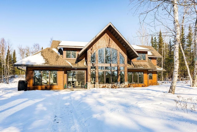 view of snow covered house