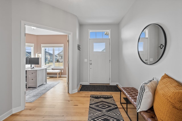 entrance foyer with light hardwood / wood-style floors