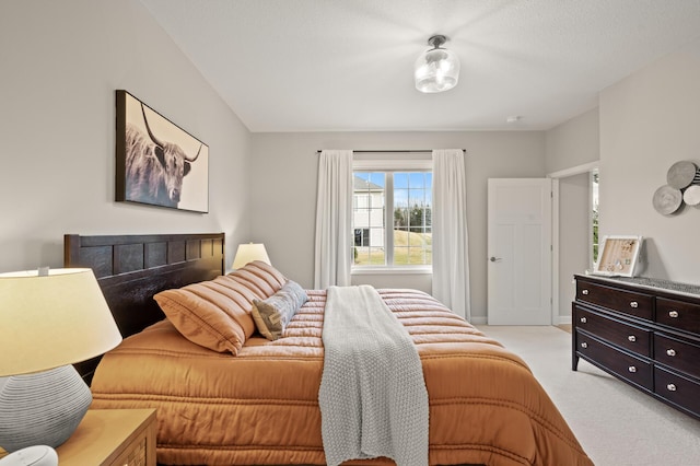 bedroom with light carpet