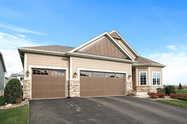 craftsman inspired home with a garage