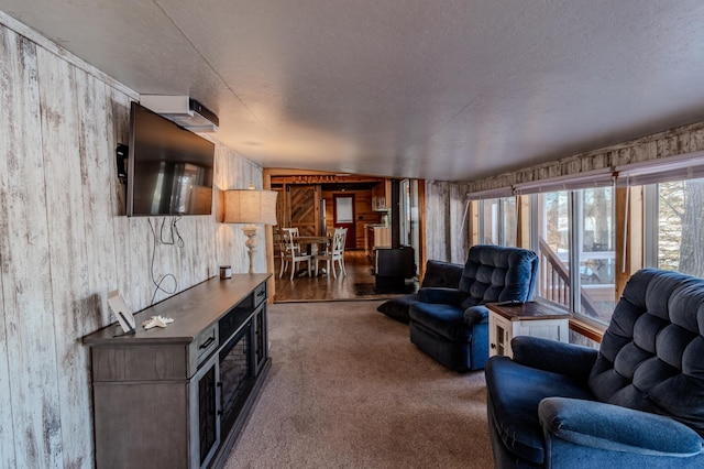 carpeted living room with lofted ceiling