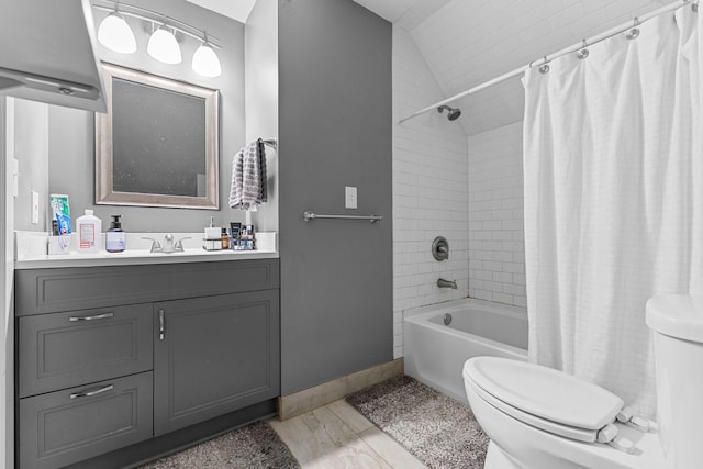 2707 Fremont Ave S, Minneapolis, MN 55408 - full bath with vanity, shower / bath combination with curtain, lofted ceiling, and marble look tiles