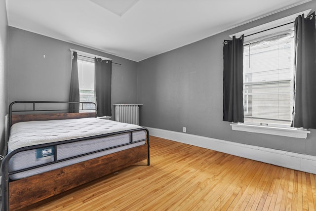 2707 Fremont Ave S, Minneapolis, MN 55408 - bedroom with radiator and hardwood / wood-style floors
