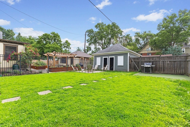 2707 Fremont Ave S, Minneapolis, MN 55408 - fenced backyard featuring a pergola, a patio, and an outdoor structure