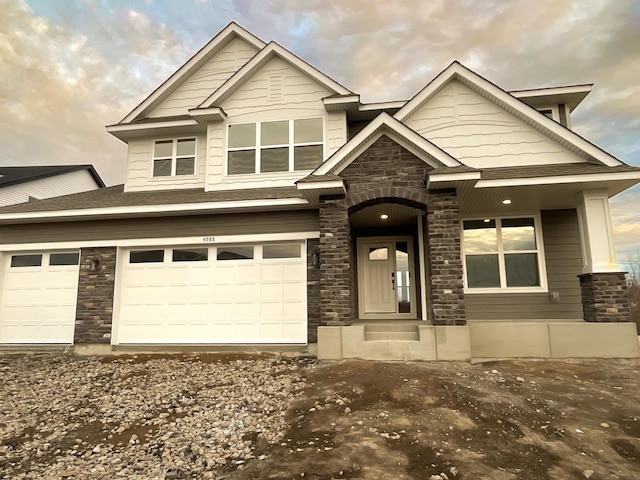 view of front of home with a garage